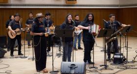 A band performs in Bates Recital Hall.