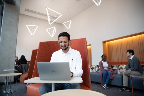 Student working on laptop