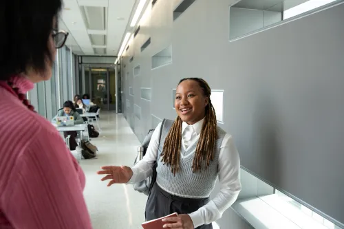 student talking and smiling